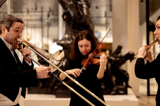 Drei Musiker:innen im Wien Museum