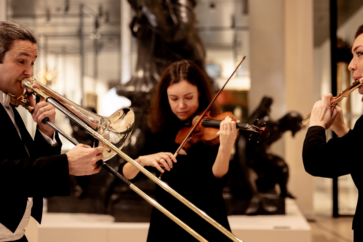 Drei Musiker:innen im Wien Museum